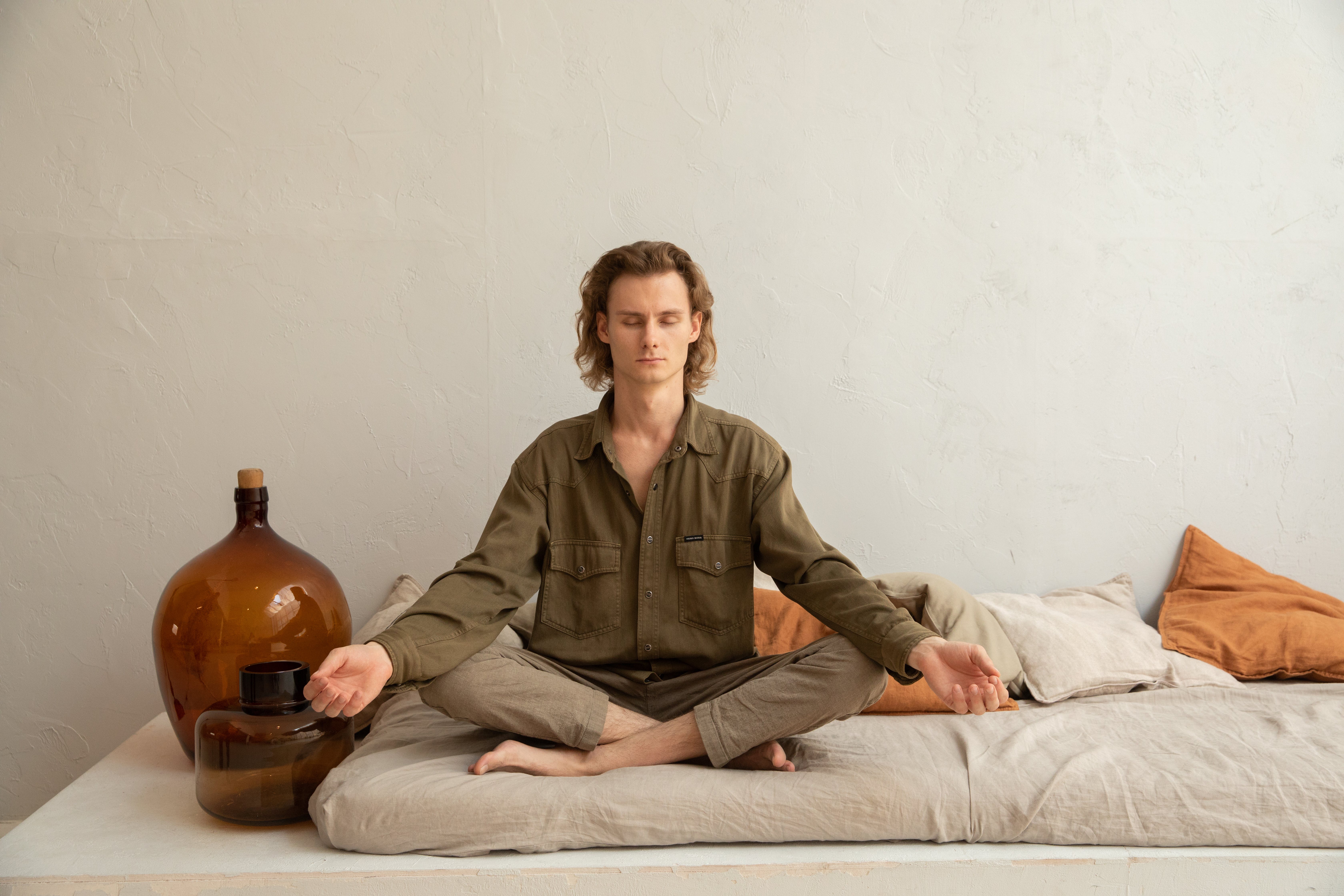 7 Essential Money Moves for 18-20 Year-Olds - image of someone meditating
