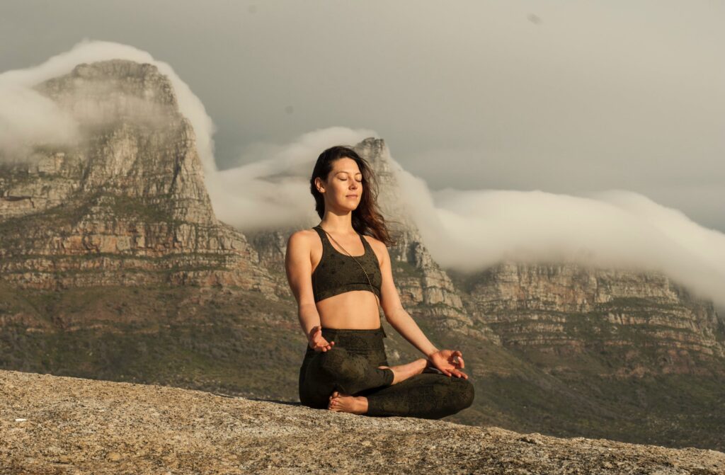 Meditation for abundance and prosperity - image of someone meditating

